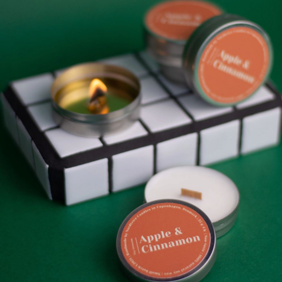 Piccola candela profumata Nortrice da 30 g, confezione elegante.